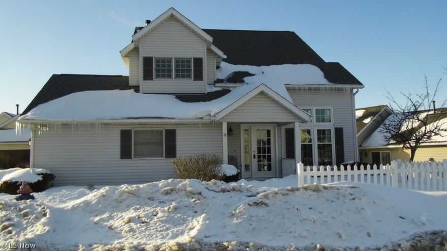 Stunning free standing colonial in MacIntosh Farms.  Enter through the new ceramic tiled foyer into a two story Living/Dining room combination freshly painted and newly carpeted.  The kitchen boasts newer custom Chestnut cabinets and Corian countertops, stainless steel refrigerator and stove, dishwasher and microwave.  There is a open and airy dining area which looks leads to the patio door with an nice private patio.  The family room has tasteful built in shelves and a beautiful wood burning fireplace.  Wood floors cover the kitchen, dining area and family room floors.  A updated first floor powder room and laundry room complete this level as well as an attached 2 car garage.  Upstairs you will find all new carpet and fresh paint in the three bedrooms.  The Master bedroom is spacious and has its own in suite bathroom and a huge walk-in closet.  Bedroom 2 has a dramatic window seat and high ceilings.  Bedroom 3 is open and airy with a loft view of the living room.  Another full Bathroo
