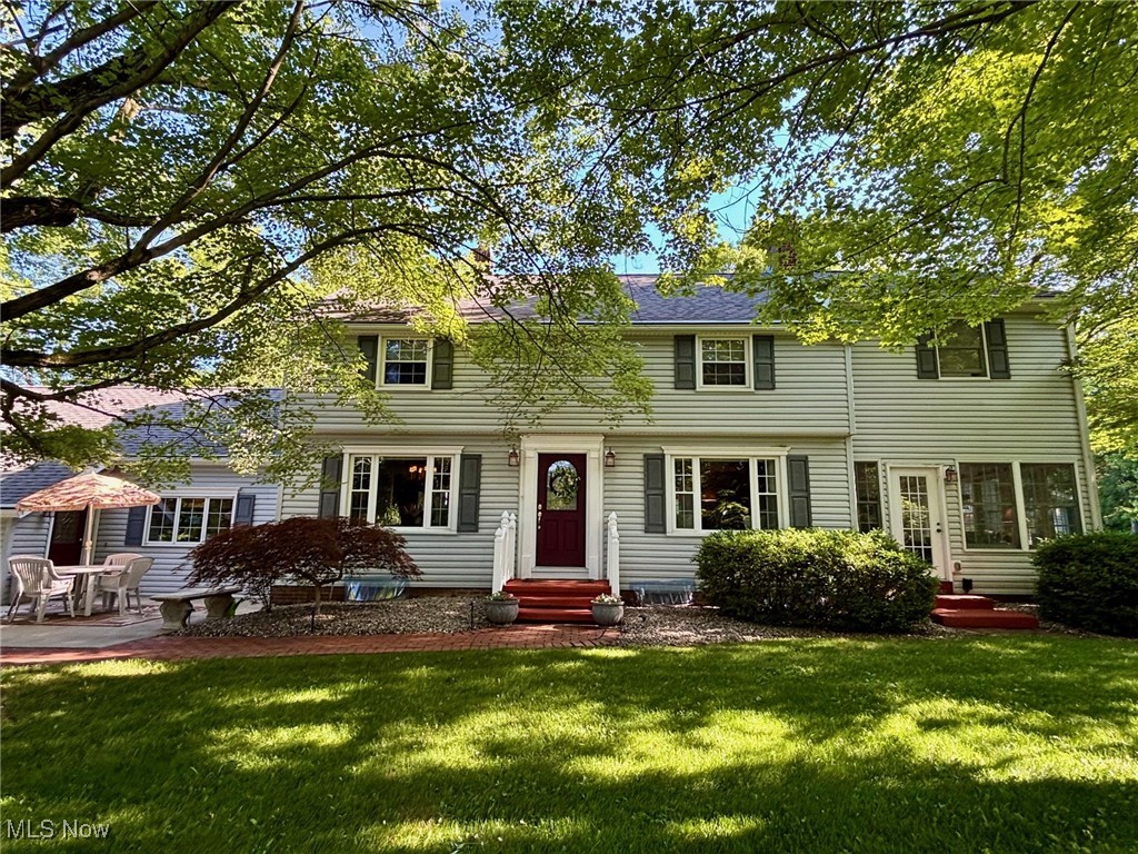 Welcome to this private 17.9-acre estate in Charlestown Township! With over 4,000 sq ft of finished living space, this home offers 4 bedrooms, 3.5 baths, with two spacious primary suites—perfect for multi-generational living.
The main-level suite features cathedral ceilings, an electric fireplace, walk-in closet, French doors leading to a patio with hot tub, plus a spa-like bath with soaking tub, separate shower, and in-suite laundry. The second-floor suite includes double closets, original oak hardwood flooring, and a large bathroom with cathedral ceiling, skylights, soaking tub, shower, linen closet, and access to a private deck—ideal for relaxing in the sun. Two additional spacious bedrooms are located on the second floor and also feature the original oak hardwood.
The heart of the home is the kitchen, complete with stainless steel appliances, Corian countertops, island, pantry, and stunning views of the scenic property. Multiple living areas include a dining room with tray ceiling, a living room with wood burning fireplace, a family room with gas fireplace, a four-seasons room surrounded by natural light, and a finished basement with gas fireplace. The office, with separate entrance, could also serve as a fifth bedroom suite or bonus room. A heated attached 2-car garage with built-in cabinetry adds convenience.
Enjoy outdoor living with 3 patios, 2 decks, gazebo, hot tub, gas fire pit, gas grill hookup, and a playhouse. The 3-stall barn with water, electric, hay loft, and extra storage is ideal for animal lovers. Mineral rights convey with the property—no gas bill and receive gas well royalties. This home has been well-maintained and regularly serviced. Too many updates to list but include: Main furnace (2024), Both A/C (2024), Roof (2017), and Hot Water Tank (2017). One-year home warranty included for peace of mind!
