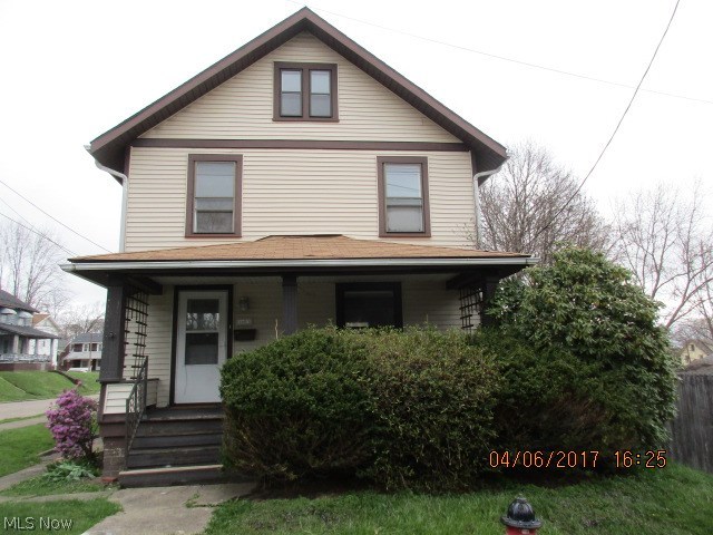3 bedroom home on corner lot with newer vinyl siding, porch & deck.