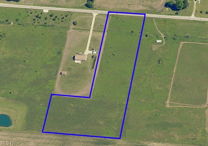 Very nice 5.5 acre building lot in northern Spencer Township. Located in an area of nice homes. Water, electric, phone and high speed internet (Armstrong fiber optic) located at the road. Bank financing available. Just 10 minutes to 10/480.