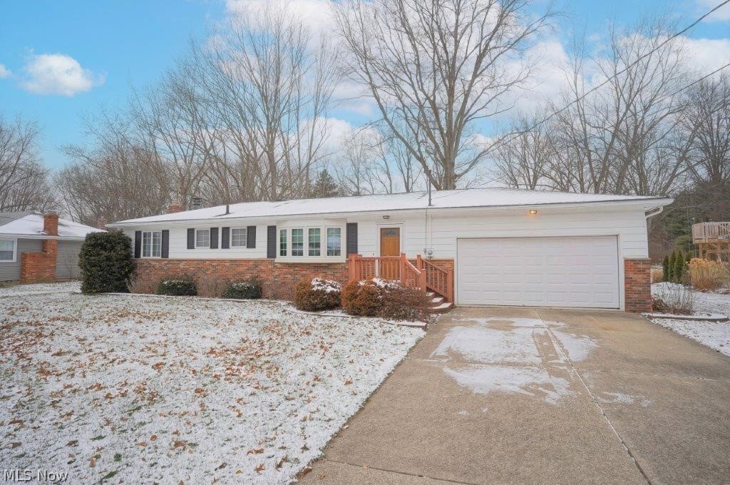 Welcome Home to 989 Maple St Tallmadge Ohio! You will love sitting in the sunroom watching the wildlife run through your yard! You will enjoy the changing seasons from your own back yard! Inside you will find a great floor plan as well as plenty of storage! The living room features a beautiful bay window.
The roof was installed in 2014, furnace in 2018, hot water tank in 2016 and a/c in 2020. The basement is finished and features an office, a rec room and a bonus space that could be a homework area or crafts room. Call your favorite real estate professional today and schedule your private showing!