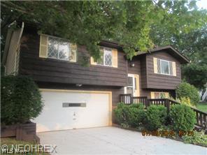 Newly renovated 3 bedroom bi-level with 1.5 baths. Two car attached garage. New roof shingles/new exterior painting/new concrete driveway/new interior painting/new carpet. Eat in kitchen. Dining room has sliding doors leading to the deck. Very nice foyer! Newly finished lower level rec room with 1/2 bath. Large rear deck across the whole back of the house that is great entertaining and barbecues. The master bedroom has a sliding door leading to the rear deck! Move in ready and easy to show!