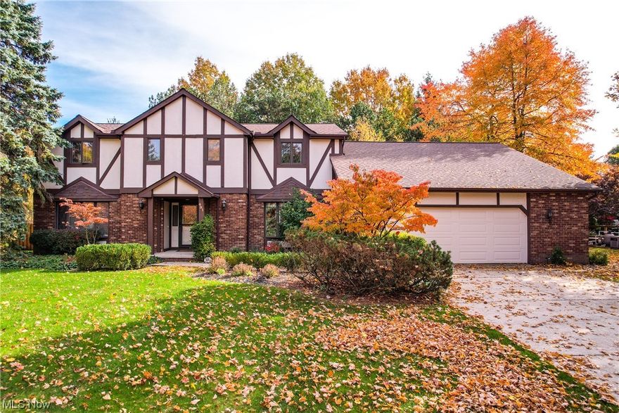 Welcome to this enchanting tudor style home where luxury meets tradition. Featuring classic timeless traditional finishes, and elegant upscale luxury custom upgrades, the warmth & beauty of this gem will encompass you. Distinctly characterized by its steeply pitched gable roofs, playfully elaborate masonry brick, embellished doorways, groupings of windows and decorative half-timbering to give it that distinctive look. The moment you enter the grand foyer, this home will captivate your imagination and take you back to the renaissance period as you notice the exposed heavy wood timber beams and decorative staircase. Boasting almost 4,000 sq ft , 5 bedrooms , 3.5 bathrooms, and many other updates. The chef's kitchen was fully renovated and includes granite countertops, and Monogram/Viking Appliances. The main floor includes 1.5 renovated baths, living room/office, dedicated dining room, eat in kitchen, family room, additional bedroom/office with built in wet bar, laundry room and a 3rd office. Upstairs includes 4 bedrooms including the master and en-suite bathroom, and separate full renovated bath. This home was well maintained , restored , and tastefully renovated in order to keep the original integrity. Also featuring a deck with full privacy fence and a woodsy lot. Located in the highly coveted city of Highland Heights with the popular Mayfield School District and nearby Stonewater golf course. Call 491 Lynden “HOME” today!