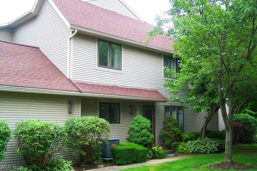 If you are looking for your own private retreat to come home to after a long day then this is it!  Spacious condo with approx. 2035 sq. ft. in North Pointe Condo Community off of Heritage Woods Dr. Enjoy the water view and high trees surrounding the water from your own private deck.  Two large bedrooms with each having their own bath.  The spacious great room and adjoining living room is perfect for entertaining large families and friends.  Kitchen is equipped with appliances and plenty of cabinet space. Spacious first floor laundry room also comes with washer and dryer, two car attached garage, 4ft. crawl space for extra storage, first floor half bath, wood burning fireplace, and a loft overlooking the great room completes this gorgeous condo.  Recent updates include Carpeting upstairs - 2015, Sliding doors - 2012.  Freshly painted 2008, Laminate Wood Floors - 2008, Master bath remodeled 2010, Furnace & AC 2011, and Hot Water Tank 2014.  Located in Copley Township within the Revere Lo