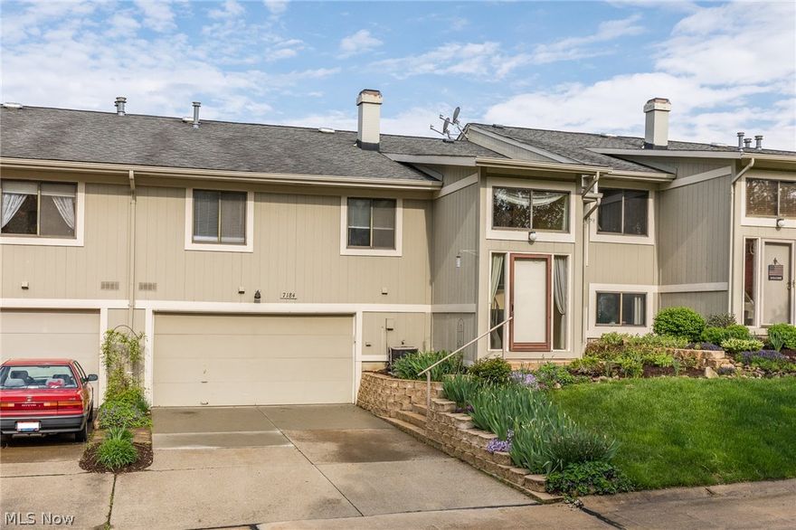 Neutral and ready for you! Large family room with beautiful stone fireplace, updated kitchenwith breakfast bar and all appliances.