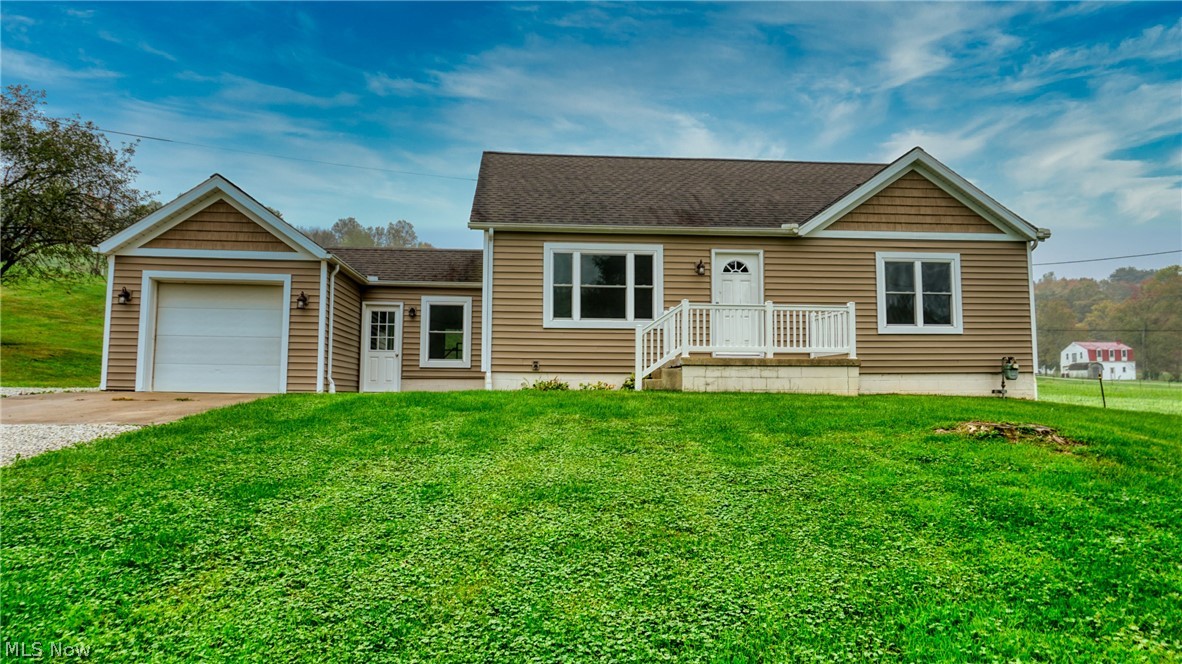 Welcome Home!! New, new, new! This home has been completely remolded with improvements to include vinyl siding and windows less than 2 years, most recent updates (2021) to include new roof and flooring throughout. New kitchen with beautiful granite counter tops and appliances. New aerator system has been installed, with county sewer available for hook up. Spotless, dry basement! Spacious bedrooms with a full loft area providing additional space. Call for a showing today!