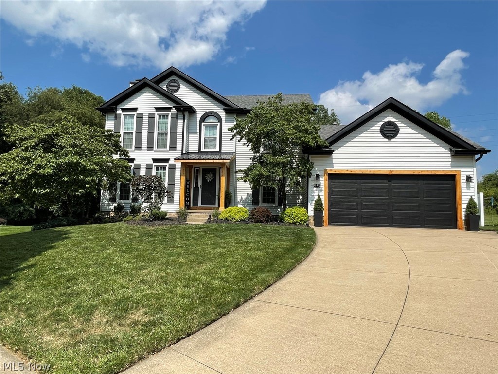 Welcome to 2119 Oxford Court! You will think that Chip and Joanna Gaines live here! This home will surely please and shows pride in ownership from top to bottom! The outside boasts freshly painted trim, metal roof over porch, new shutters as well as cedar accents (2021) * Step into the foyer and you'll fall in love with the updated steps and railing to the 2nd level, crown molding, as well as the new luxury vinyl plank throughout the entire first floor * Kitchen features granite countertops, updated tile backsplash, 2 pantries, lots of counter space, generous eating area, fresh paint, new cabinetry hardware and a full array of stainless appliances * Great room features a gas white washed masonry fireplace, crown molding and oversized windows to let in the sunlight * Formal dining rm with crown molding, updated half bath (granite top cabinet) and new patio door complete the first floor * Upstairs features a vaulted master bedroom, large walk in closet with upper extension, updated