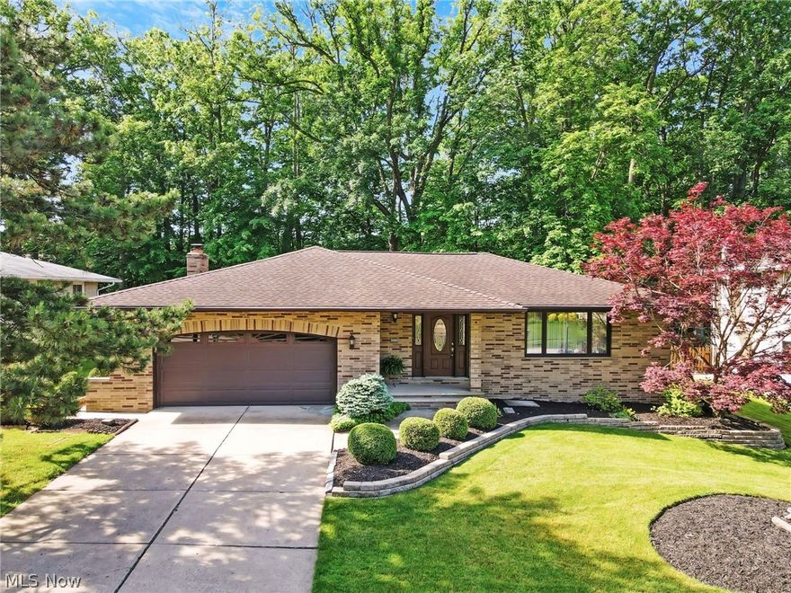 Better hurry! Location…location…location. This home is located deep in the Sassafras Hills neighborhood on a quiet street in a peaceful, wooded setting. This 3-bedroom, all-brick ranch home with a 2-car attached garage is on a prime lot which is larger than most similarly designed homes. It boasts 1,925 sf of finished space on the main level with a gorgeous façade, carefully maintained landscaping, and a rear patio with wooded rear views that is perfect for relaxing after a long day. Step inside a spacious foyer with an open concept living room and a dining room ready for large holiday gatherings. The eat-in kitchen is centrally located with ample cabinetry and generous countertop space. Step down to the large family room with a gorgeous gas log fireplace, and access to the lovely backyard patio. There is also a remodeled half bath with a second entrance to the rear primary bedroom for added convenience. There are two other generous sized bedrooms, with closet organizers, and a shared hall bath. The 2-car attached garage has substantial storage space. The original owner has lovingly cared for this home, and it shows throughout. Thoughtful upgrades and meticulous maintenance include: an electric panel & GFCI’s (2024), exterior waterproofing (2022) with a fully transferable warranty for the life of the home, AC (2022) and furnace (2019), an Infinity by Marvin slider (2017), and a roof (2010). The street is in the process of having fiber optic cable laid – a huge future benefit for working from home, standard cable speeds are also available today. Centrally located to all major shopping, restaurants, medical, Cleveland Hopkins Airport, downtown Cleveland, MetroHealth Hospital, both east and west sides via I-480, Cleveland Metroparks West Creek Reservation, golfing, University Circle, Cleveland Clinic, University Hospitals and more. Check out the included 2D and 3D floor plans in the photos and the 3D immersive Matterport video for a detailed tour.