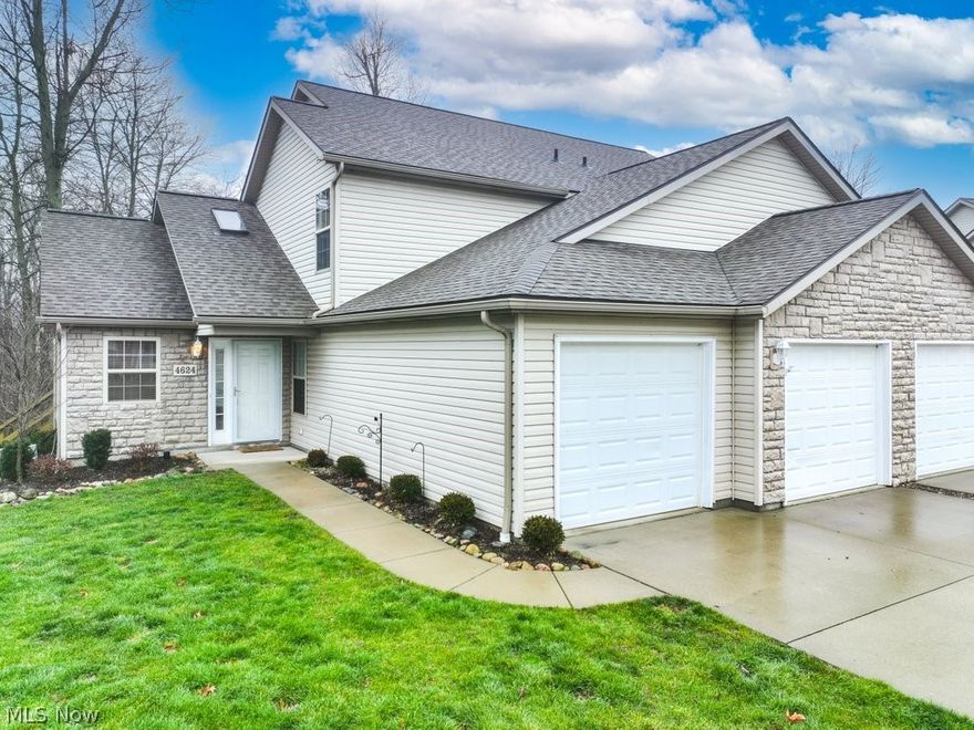 If you desire low-maintenance condominium living, look no further than Creekside at Pleasant Lakes! This beautifully updated end-unit condo has the best of all worlds - Open Floorplan, Vaulted Ceilings, First Floor Bedroom AND First Floor Updated FULL Bath with walk-in shower PLUS a main-level laundry room with washer and dryer (included) and attached two-car garage! The entire first floor wows with gorgeous low-maintenance luxury vinyl plank flooring and features a cozy Electric Fireplace and a sliding door that leads out to the LARGE Deck overlooking the private wooded view of Plum Creek. Enjoy the serene wooded views from the kitchen, which includes newer appliances (2017). Upstairs is the Primary Bedroom with Walk-in Closet and Vaulted Ceilings and an updated Jack and Jill Bathroom that is shared with a third Bedroom! Enjoy the convenience of no basement worries and loads of closet space and storage above the garage! Not to mention, the Landscaping, Snow and Trash Removal are ALL c