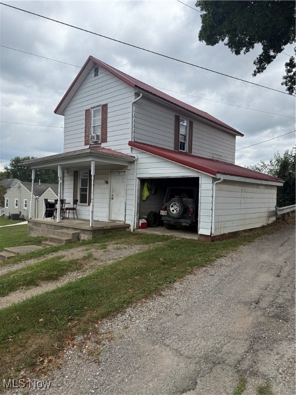 Looking for small town charm, here is one on a corner lot! Offers convenience and is close to local pool and park, grocery store, banking, shopping and more. Comes with a metal roof, newer windows, updated spacious kitchen and bath. First floor laundry, 2 beds on second floor and potential for 1 bed on main floor. Attached garage, Crooksville schools, updated electric hot water tank and water lines.