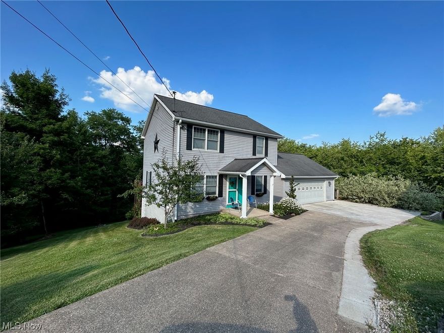 Sitting on a dead end street and offering over a half acre in town! Home offers a eat-in kitchen with island, Corian countertops with undermount sink offering a sliding door with built-in blinds leading you to deck overlooking your private wooded back yard. In addition, first floor offers a spacious laundry room, pantry area and entry to your two car garage, private office area or could be small play room and living room open to kitchen with spacious windows allowing for lots of natural light.  Upper level offers 3 bedrooms, one being a master suite with walk-in shower.  Lower level offers a rec room area and family room with gas fireplace open to a wet bar area. Family room offers a sliding door to lower level deck that joins upper level deck and easy access to your partially finished back yard.  This fenced in area is perfect for pets.  Updates current owners were told about in recent years: roof, siding, fascia, deck and soffits were new in 2007, Anderson Windows installed 2009, fur