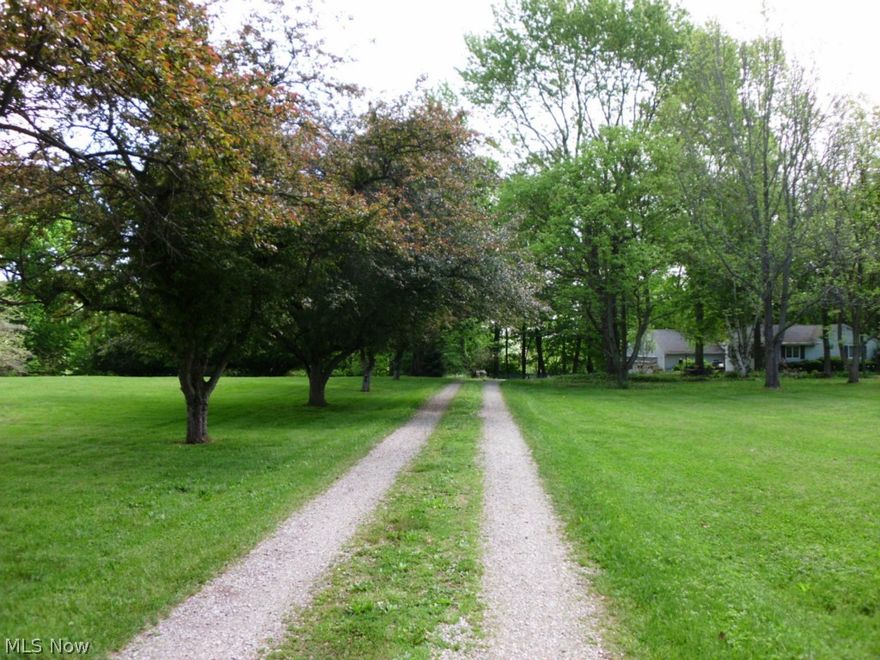 If you love nature, this is the house for you. Come and see this lovely family ranch home located in the heart of Bath and sits on 1.6 private acres surrounded with beautiful scenic views. Large open and recently updated country kitchen with cathedral beamed ceilings, fireplace and a Jen Air range with double ovens. Gorgeous newly built four season sun room with ceramic flooring surrounded by windows and spectacular wooded views, a real bird watchers paradise! 3 bedrooms have wood floors and large walk in closets for plenty of storage. Master bedroom has a full bath. The fourth bedroom has carpeting and built ins with its own entrance. The possibilities are endless, an in law suite or teen suite, playroom for children or a private library or office. A beautiful great room with a wood burning fireplace surrounded by built in bookshelves. The home also has a walk out basement with a large laundry room. A new septic system was installed in 2014. The cistern is spring fed with a new UV wat