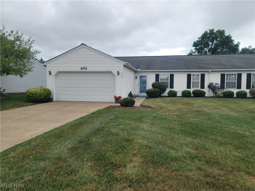 Easy one floor living in desirable Farmington Meadows! 
Your comfortable living room features a vaulted ceiling and distressed hickory wide plank hardwood floors. This open concept flows into the dining room and kitchen with newer stainless steel appliances and maple cabinets. The laundry has plenty of storage a washer and newer dryer. 
A sunroom is attached with a ceiling fan and nature stone flooring. Outside is a stone paver patio and a partial privacy fence. This home has plenty of green space, lovely trees and backs up to Bellflower park. Relax and enjoy nature. The beautiful sunsets can be viewed from the outside and nearly every room inside all year long!  Natural light flows throughout this warm inviting home!
There are 3 bedrooms and 2 full baths. The primary bedroom features newer carpet, paint and a California closet. The en suite has been updated with a barn door, newer paint, walk in shower, vanity, faucets and quartz countertops. 
The newer front and back storm doors have retractable screens and a 2 car garage is attached. 
Sidewalks to walk or bike on as well as a walking trail in the park located right in your neighborhood. There are also tennis courts, a pond for fishing, and much more. Secluded yet minutes to shopping, restaurants, medical, schools, outdoor concerts and Lake Erie. 
The best of both worlds!