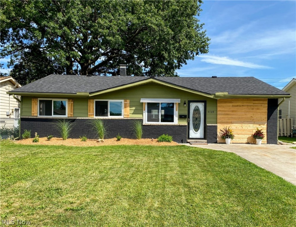 Updated single story on Lorain's Southside near school with easy access to highway. Freshly painted interior and exterior with updated front landscaping. New roof (Aug 22'), new windows (Aug 22'), and all new flooring (Sept 22'). New modernized bath and kitchen with new range and hood included. Water Heater was replaced in May 2020. Tiled bathroom tub/shower. Central Air. 3 bedrooms with an additional 4th bonus room/bedroom square footage from converted garage area by the previous owner. Driveway parking - no garage. Fenced-in backyard. Quite neighborhood. Ready for immediate move in.