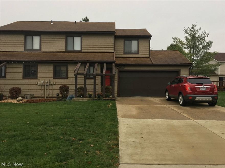 Beautifully remodeled townhome.  Kitchen has Charleston Cherry cabinets with stainless steel appliances and granite counter tops.  All baths have ceramic tile. Lower level has been finished including another full bath making for a great family room area.  This home has a two car attached garage with opener.