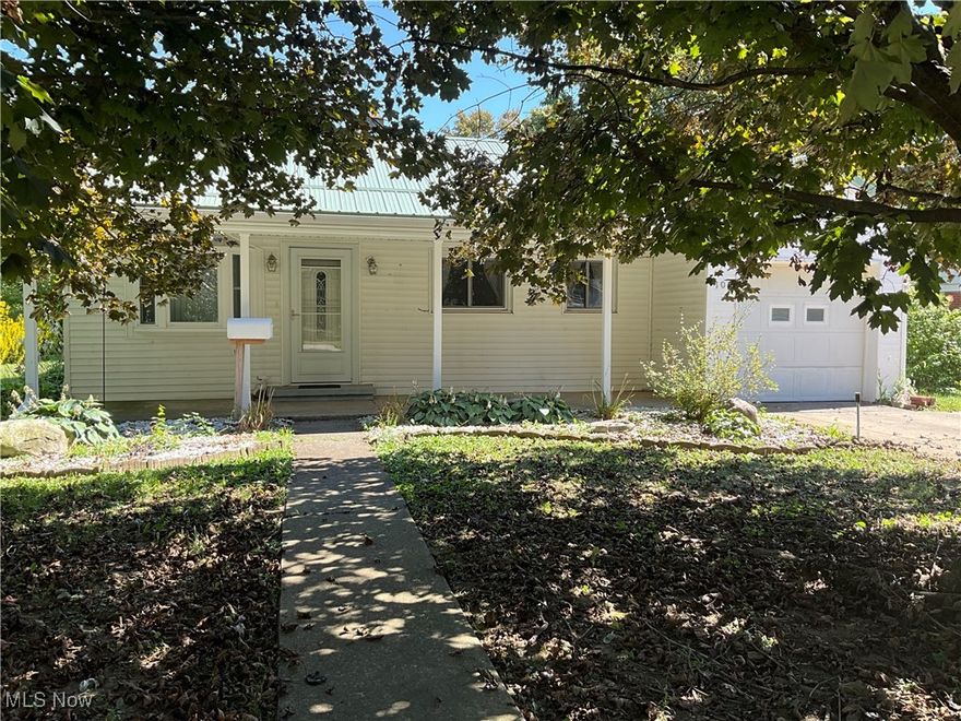 Nice cozy 2 BR, 1 bath ranch home. The home has many extras & updates. Enclosed back porch, covered concrete side patio (fenced in for your animals), covered concrete front porch, fenced in back yard has 2 storage sheds, whole house generator & appliances are included. Close to NL Rec park & within walking distance of downtown.