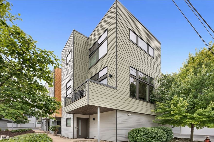 Welcoming 18875 Riversouth Ter #7 to the market. This stylish and modern townhouse in Fairview Park is a must see! Fantastic location! This corner unit offers over 1,200 sq ft of well-designed living space. The first floor includes an attached garage, foyer, and coat closet, while the main living area upstairs features an open-concept layout with a cozy fireplace, TV alcove, and sliding doors to a private balcony. The kitchen boasts quartz counters, stainless steel appliances, a subway tile backsplash, and a breakfast bar, with a convenient half bath nearby. The top floor is a dedicated primary suite with a spacious bedroom, walk-in closet, laundry closet, and a luxurious ensuite bath with a double vanity, soaking tub, and step-in shower. Enjoy an additional private balcony off the suite. Located above the Rocky River, this home is just moments from shopping, dining, Kamms Corner, and easy highway access. A fantastic opportunity in a sought-after area! Schedule your private tour today.