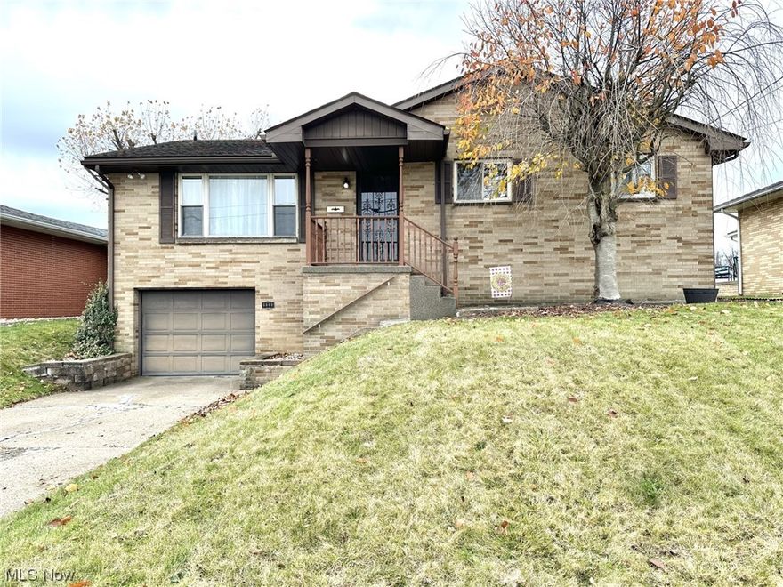LAY OUT THE WELCOME MAT... at this 3 bedroom, 1.5 bath brick on Marland Heights that won't last long!  Inviting from inside out, this home features a welcoming living room, a light, bright equipped kitchen with dining room for seamless entertaining, 3 bedrooms and full bath on the main floor.  The lower level hosts a spacious recreation room with pool table, bar and 1/2 bath for endless entertaining possibilities.  There's a deck overlooking a large yard perfect for relaxing, kids, pets or your very own garden.  1 car garage, central air and more!