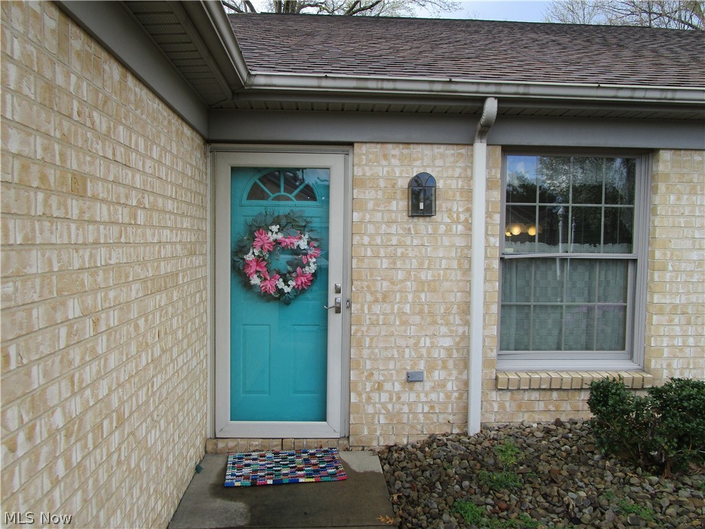 Move in to this lovely 2 bedroom, 2 bath condo in the Southwestern Run development. Kitchen has newer appliances that stay, newer hard wood/laminate flooring, and beautiful granite counters and backsplash! The large living/dining room has been painted with newer carpet. Continue through to a cozy family room with a gas brick fireplace and sliding glass doors to your very own private patio and wooded backyard. The large Master bedroom has a full bath and large walk-in closet. The second bedroom also has a walk-in closet, with 2nd full bath nearby. Laundry room has plenty of storage and washer and dryer stay. Furnace and hot water tank-2019, A/C-2010 Plenty of storage in the 2-car garage as well as a small workbench. This won't last!