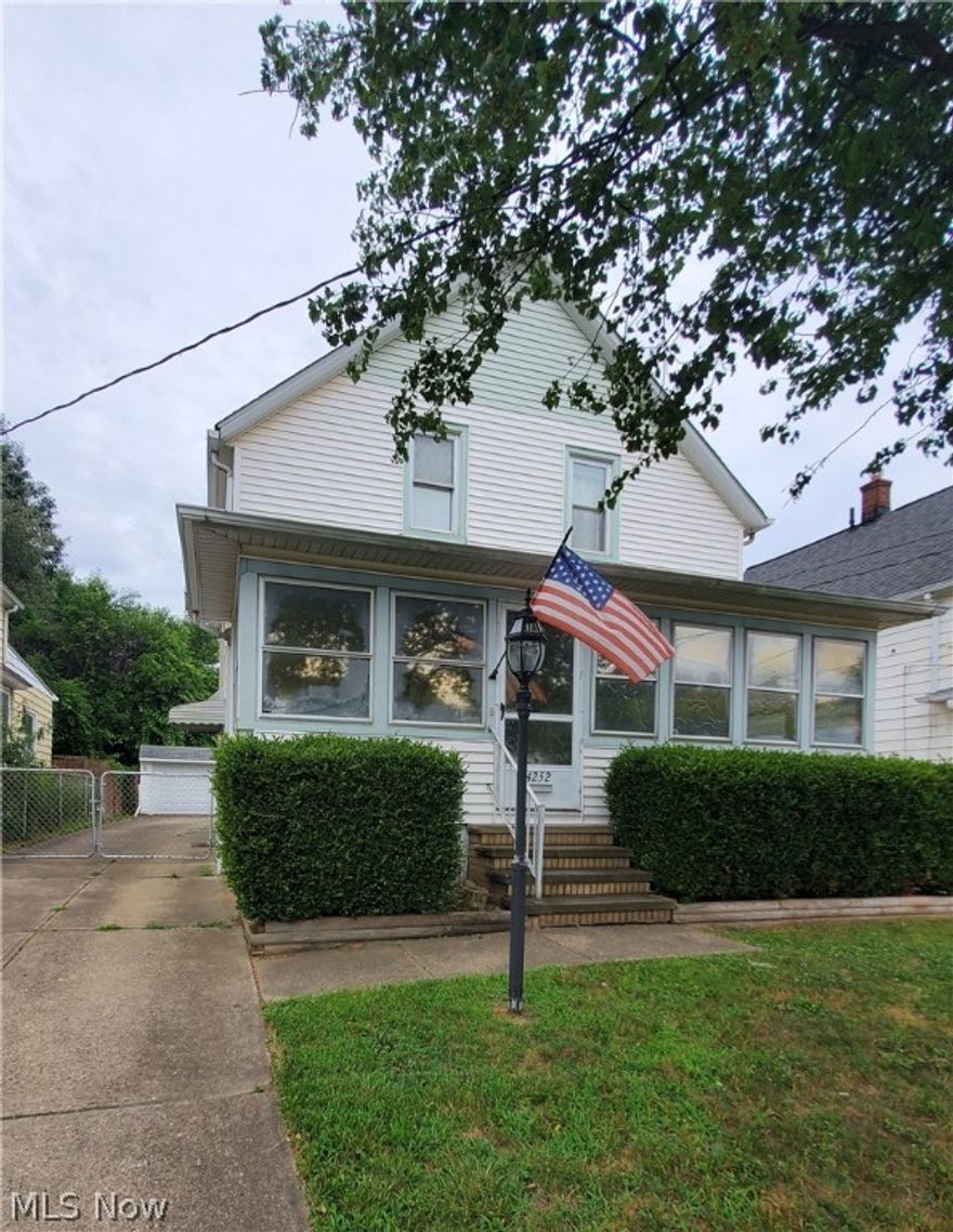 Relish the comfort of the enclosed front porch or the spacious back deck, complemented by a large, fully-fenced yard. This three-bedroom Colonial features a master bedroom with additional space for an office or storage. The residence includes an eat-in kitchen, foyer, dining room, and living room adorned with natural woodwork, as well as central air conditioning. The basement is partially finished, boasting glass block windows, waterproofing, a second bathroom, and updated electrical and plumbing systems, with a new hot water tank installed in June 2024. Additionally, the expansive two-car garage is insulated and equipped with a workbench. The property is being sold as-is.