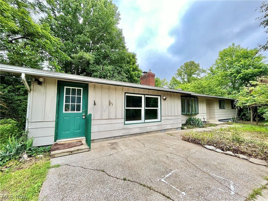 Conneaut Creek Front! 3 bedroom, 1.5 bath (with the possibility of using 2 additional framed in bedrooms in the walk-out basement to give a total of 5) ranch set in a fantastic location, close to Blue Belle, the Creek Rd Covered Bridge AND SOME OF THE BEST STEELHEAD AND FLY FISHING IN THE WORLD! This single story features newly installed hickory hardwood floors in the spacious family room, red oak hardwoods in the living room and eat-in kitchen. The kitchen features a center island w/dishwasher, gas range and sliders to a patio that overlooks the creek. Skylights in the living room and kitchen enhance the beauty with an abundance of natural lighting. Wood-burning fireplace in the living room with custom craftsman mantle. You're sure to love the private, off-the- beaten path location, with city water, AC plus quick and easy access to I-90. 160 feet of Conneaut Creek frontage.