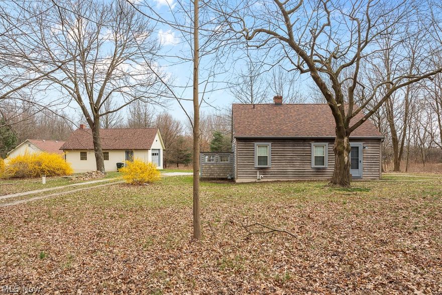 Wow! Look at this unique property! Marlington Local Schools/Washington Township with over 5.5 acres, mostly wooded. Updated windows, newer septic, and roof. House has 1 bedroom currently but possibly 1-2 more could be made into or added. 2 unbelievable buildings! Concert block buildings, one with water, electricity, and heat in immaculate condition. The whole property has been well cared for and taken care of. The seller has added some unique built-ins and extras to the property that you truly need to see to be appreciated. Take a look at this property! The possibilities are endless here. Turn the buildings into living spaces, have an in-home business, plus much more.