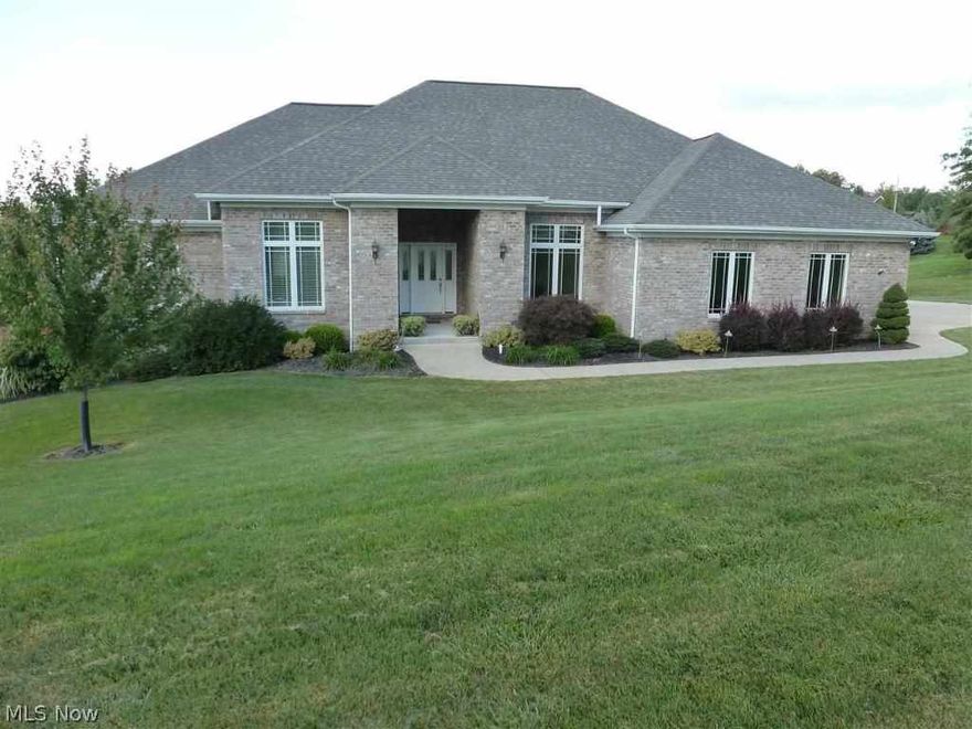 Absolutely perfect!! This ranch home has 4 bedrooms, 3 1/2 baths, open floor plan, covered 27 x 12 trex deck and 4.5 car garage.