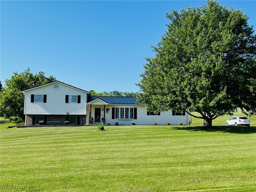 ALMOST MOVE IN READY Home on 1.49 Acres with Pool, Hot Tub& More! Welcome to your dream retreat! This updated 3-bedroom home sits on a spacious lot, offering privacy, comfort, and all the extras you've been looking for. From the moment you arrive, you'll notice the pride of ownership and thoughtful upgrades throughout. KEY FEATURES: 3BR, 2.5 Ba, above ground pool with custom deck and gazebo-perfect for entertaining or relaxing. Hot tub included -your private oasis awaits. All appliances stay, making your move even easier. This home offers the perfect blend of modern convenience and country charm. Whether you're hosting summer BBQ's by the pool or enjoying quiet evenings under the gazebo, this property has something for everyone. Per seller, the septic is cleaned out every other year by Ohio Valley Septic. HVAC serviced yearly, and filters changed quarterly. Water heater new in 2024.New shower surround has been ordered for the master bath. Projected delivery date is Aug 15, 2025.