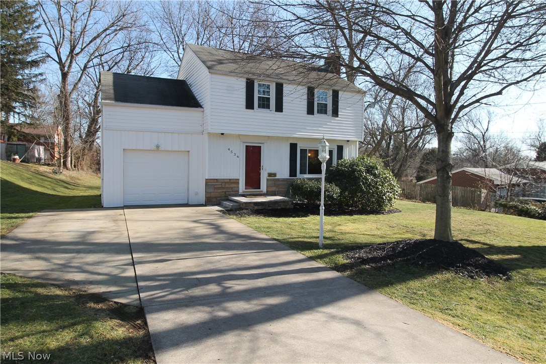 Welcome to this beautiful, charming three bedroom, one and a half bath Colonial. Spacious newer kitchen remodeled in 2015 with newer cabinets, sink, and faucet; refrigerator in 2014, stove in 2011 and the dishwasher in 2009; which comes with ample storage and counter space. Your eating area flows into the large, bright family room with a cozy gas fireplace to relax by on these chilly nights, and the large front window in the family room was replaced in 2012 and all carpeting in every room except two bedrooms replaced in 2014. Bathrooms have newer fixtures, lights installed, and painting in 2015. Upstairs is the large master bedroom with walk in closet, and two other bedrooms and full bath which complete the upstairs. The lower level is finished, and has been waterproofed inside and out. For your convenience you will find a half bath and laundry room on lower level. This glorious home is on a nice large lot, with fenced in backyard, nice and private with a newer large deck built in