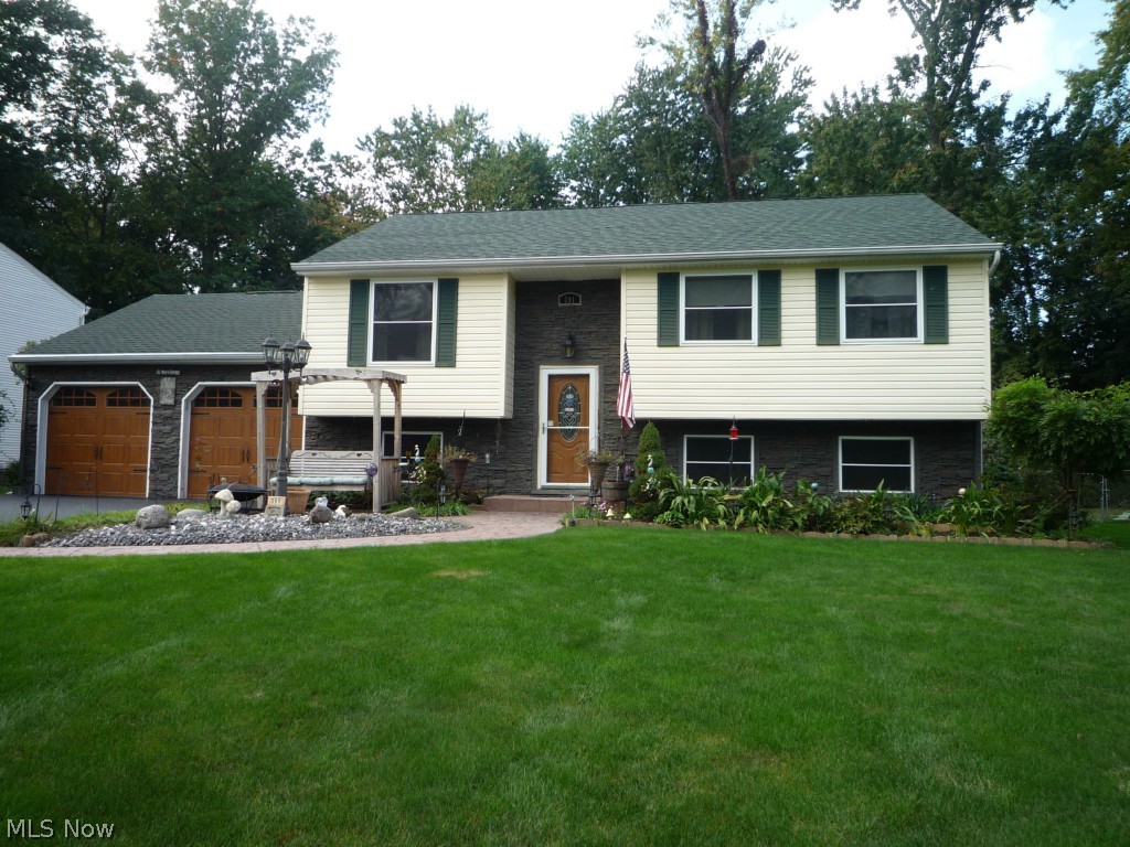 Above and beyond expresses everything about this wonderful home. The homeowner's meticulous updates and care is shown throughout. The updated kitchen has custom made oak cabinets that are complimented with granite countertops and a double wall pantry. The eat-in kitchen leads to you the amazing 3-season room with incredible views of the backyard. The updated trex deck leads to a backyard sanctuary that includes a pond/gazebo (hot tub) and a fully fenced backyard. All stainless kitchen appliances remain along with the washer/dryer and the home is equipped with a hook up for a back up generator. The bathrooms have high end Moen faucets and the lower level bathroom was completely redone. The bedrooms and main bathroom have six panel solid oak doors and the foyer has been updated with its flooring, fixtures and handrails. The TRANE furnace is newer and has been serviced yearly since its install. The home also enjoys a tankless hot water system. The bonus room could be converted to