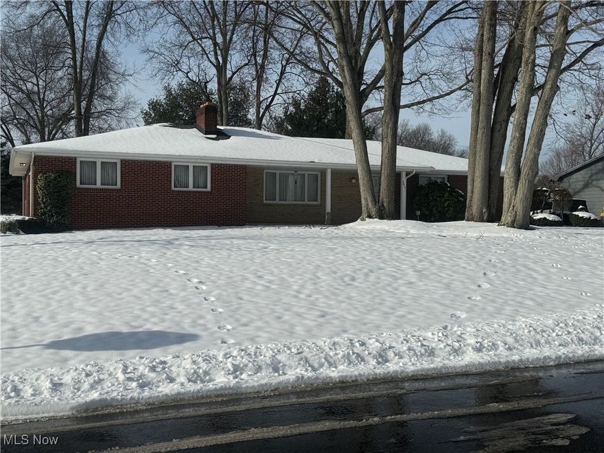 Welcome to a true mid-century modern opportunity. This well cared for one owner brick ranch offers timeless design and incredible potential for customization. The home features 3 bedrooms and 2 bathrooms with a layout showcasing the era's clean lines, simple form and solid construction.  The generous floor plan features a foyer with slate tile, a spacious living room with wood burning fireplace, dining room, and an eat in kitchen with attached family room. Step outside to your brick patio and take in the peaceful backyard views; an ideal spot for morning coffee, summer dinners, or relaxing evenings.  A full unfinished basement provides endless potential for creating the ultimate recreation or storage space. Call today for your private showing!