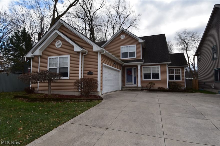 Unique opportunity near Kamm's Corner in West Park! Built in 2004, this house has an open layout, vaulted ceilings, larger fenced-in lot, first-floor master suite, first-floor laundry, attached two-car garage. Beautiful, bright kitchen with loads of cabinets and pantry includes stainless steel appliances. Living room has gas-log fireplace and is open to other first-floor living areas. Large kitchen peninsula is adjacent to dining room, which makes this house ideal for gatherings. First floor office has many potential uses. Dining room has bay door/windows with access to large deck. First-floor half-bath. Two bedrooms and full bath on second floor. Wonderful lighting throughout. Full basement with half-bath. Additional storage areas on second floor and basement. Conveniently located near Rocky River Dr. with easy access to shopping, restaurants, transportation and airport. Meticulously maintained home with so many pluses--don't miss!