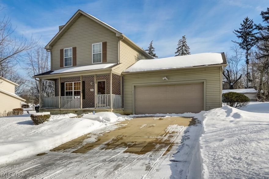 This Akron two-story home offers a two-car garage.