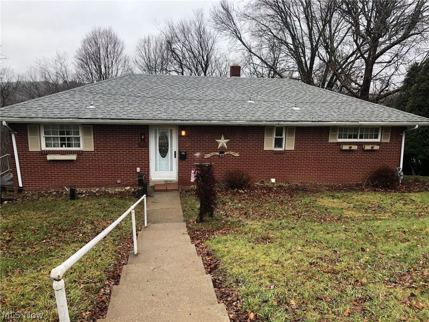 Updated brick ranch with fully finished basement.