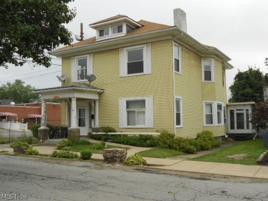 Beautiful home in the Historic section of downtown Steubenville.  Entrance has character, some leaded glass windows, 5 fireplaces, bath off master bedroom, 18.5x7.5 Screened room and 7.5x13.5 deck.  All this house needs is some love.