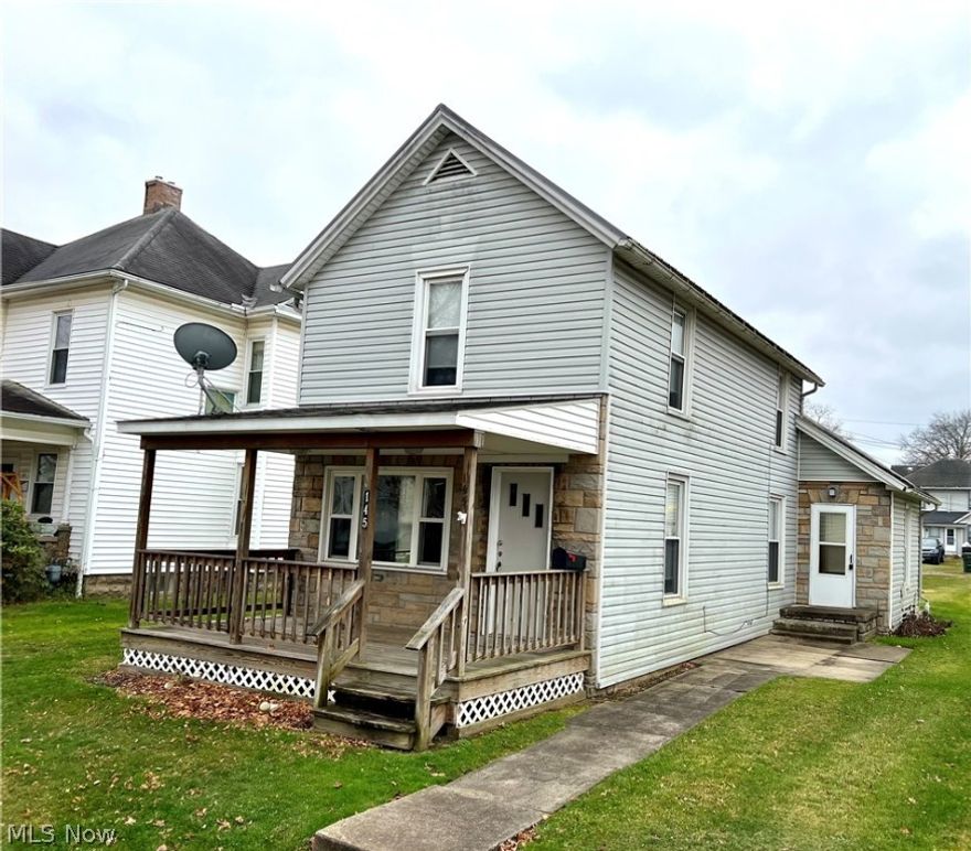 This is a spacious 2 bedroom, 1 bathroom home on a large flat lot with off street parking.  Updates include new paint and flooring, new furnace in 2021, and newer metal roof on the main part of the house. Cute house with lots of curb appeal! Agent owned.