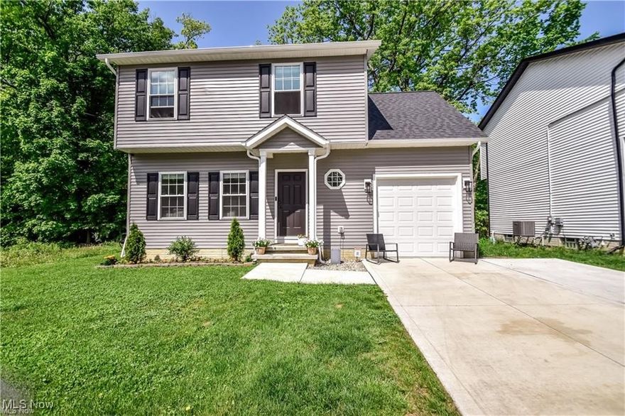 Experience comfortable, flexible living in this charming 3-bed, 2½-bath Mentor residence. This home offers both privacy and function. Tucked away on a quiet, tree-lined street, the property welcomes you with an extended driveway—ideal for multiple vehicles or boat storage—leading to a one-car garage and additional off-street parking. Inside, discover a thoughtfully designed private master suite complete with a private bathroom and an expansive walk-in closet—your personal retreat at day’s end. Two additional generously sized bedrooms and a well-appointed main bath accommodate family, guests, or a home office with ease. The eat-in kitchen features ample cabinet and counter space, ready for your culinary creations. Step outside to a level, fenced backyard—an entertainer’s oasis for summer barbecues, gardening, or simply unwinding under the sun. This home blends everyday convenience with the relaxed lifestyle you’ve been seeking. Don’t miss your chance to make 5020 Lakeview Dr. your new address!