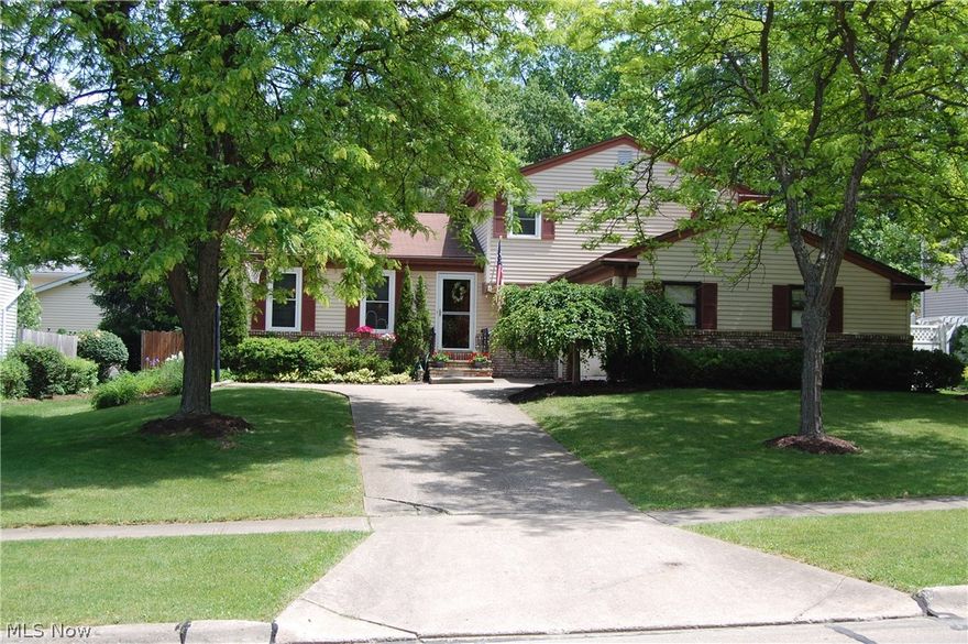 This fabulous home features an open floor plan. You will enjoy the vaulted ceilings and natural light in the dining room and living room. During  the winter months you'll be able to cozy up to the fireplace in the family room. The outside of the chimney was finished specially with river rock. There are 4 nice sized bedrooms, 3 are upstairs and the fourth is on the lower level near the second full bathroom. If you were looking for more space you'll definitely be pleased with the finished partial basement. During the summer you can enjoy the established flowers, shrubs, and trees that are beautifully maintained from the privacy of your owned fenced in backyard. Call for your showing today!