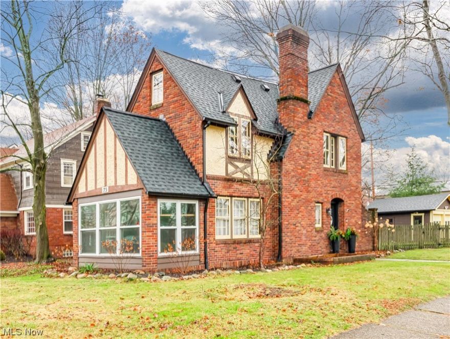 On the corner of Melbourne & Radcliffe is one of the most charming Tudors in Castle Park; straight out of a fairytale. Inside you'll find a newly renovated kitchen with high-end Cafe appliances & quartz counters, new ceramic tile sunroom floor, new boiler '21, roof, gutters & downspouts '21, newer wood-look laminate floors throughout, renovated full BA, TWO half baths, newer sunroom windows ('13) & newer blinds throughout. Living room has cozy woodburning FP w stone surround & wood mantel, extra wide baseboards, lots of windows incl. arched niche w built-in storage and French doors leading to an adorable sunroom overlooking Melbourne. Pass through archway to large charming dining room w wood-look flooring, 5 large windows for great light & new wainscoting. Off of dining room is eat-in kitchen w/new dark blue cabinets (incl. built-in butler pantry w/glass front cabs and live-edge bar table), farmhouse sink, quartz counters, tile backsplash, & a suite of Matte White Cafe appliances with brushed bronze hardware (approx. $9k at purchase).  Updated 1/2 BA w pedestal sink & shiplap wall on 1st floor. Upstairs find 3 large BRs incl. 17x13 primary BR w large windows, hallway leading to en suite 1/2 BA (feat original rose vitrolite tile!) lined w closet built-ins.  BRs 2 & 3 (both super spacious) feature original interior doors & casement windows. Full BA previously renovated down to the studs & feat newer vanity, wood-look ceramic tile, reglazed tub & brushed nickel plumbing fixtures.  Finished 3rd floor features a great playroom or craft room (accessed by pulldown steps). Basement with rec room w wood panel detail on walls, ample storage, radon mit. sys. & washer/dryer stay! Updated sewer line to the street '17.  Great updates juxtaposed with original charm. Close to great shopping, dining & easy highway access!