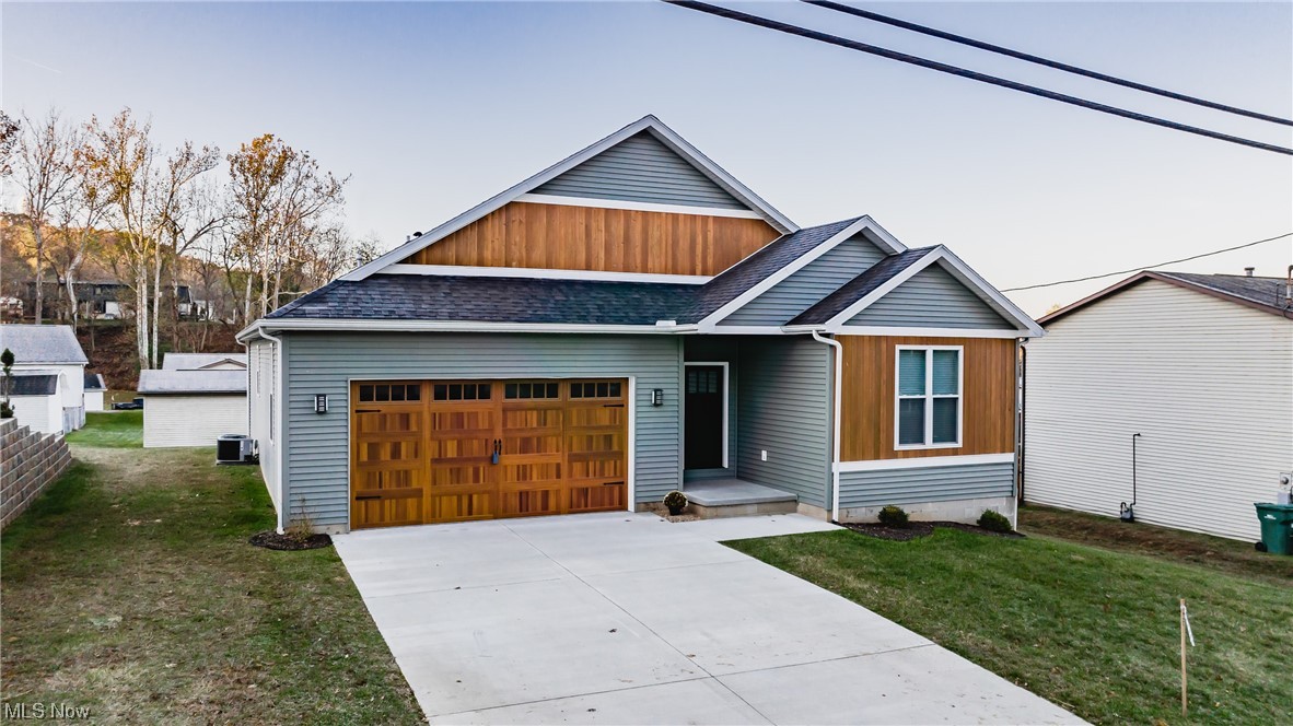 This newly completed one floor single family home was built in 2021, but has not been lived. You will love cooking in the kitchen while viewing the gas fireplace that is in the living room, cooking on name brand appliances, with center island and granite countertops. There are two additional bedrooms with the main bath between them. Large laundry closet and screened in back patio. Check out the walls and ceiling in the double garage!!!