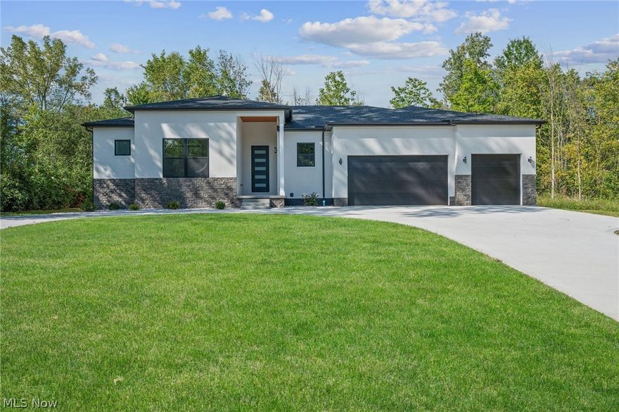 This stunning custom new-built Ranch-style home in the highly desired Highland School District offers the perfect blend of luxury, comfort, and convenience. Designed with an open-concept single-level floor plan, the home features soaring 10-foot ceilings throughout and vaulted ceilings in the family, kitchen, and dining areas, creating a spacious and inviting atmosphere. The gourmet kitchen boasts a large island overlooking the family room, complete with a cozy modern fireplace—ideal for entertaining or relaxing. The master suite includes elegant tray ceilings, a private covered porch, and a spa-inspired bathroom with an oversized walk-in shower. Two additional bedrooms share a flexible Jack and Jill bathroom, perfect for family or guests. Additional highlights include a full basement with 9-foot ceilings, a 3-car garage, a spacious covered backyard porch, and an oversized U-shaped driveway for easy access.