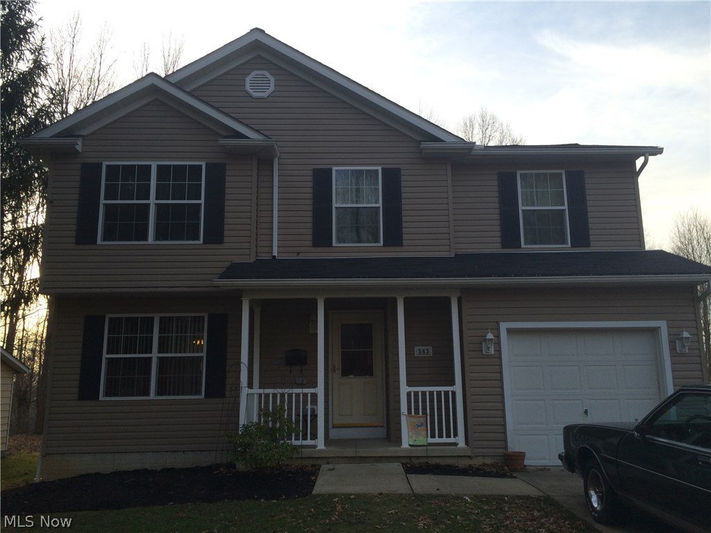 Charming 4 bedroom, 2 bath newer built home, located in the heart of Ravenna City. Features new Pergo wood flooring, a large deck for entertaining, outdoor shed and a full basement. Built in sump pump, gutter screens and a new hot water tank. Turn-Key house; move in ready with little to no maintenance!