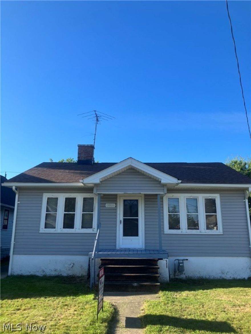 Located in Historic Old Brooklyn, This home has loads of potential, All Natural hardwood floors throughout, Great original lead glass cabinetry in Dining room . Newer roof, Gutters, Vinyl siding, With most windows replaced Complement the home. Kitchen has been updated with oak cabinets & Formica Top's, Updated Electrical panel & Vented glass block. All the appliances remain in the home! Large Back Yard to enjoy!