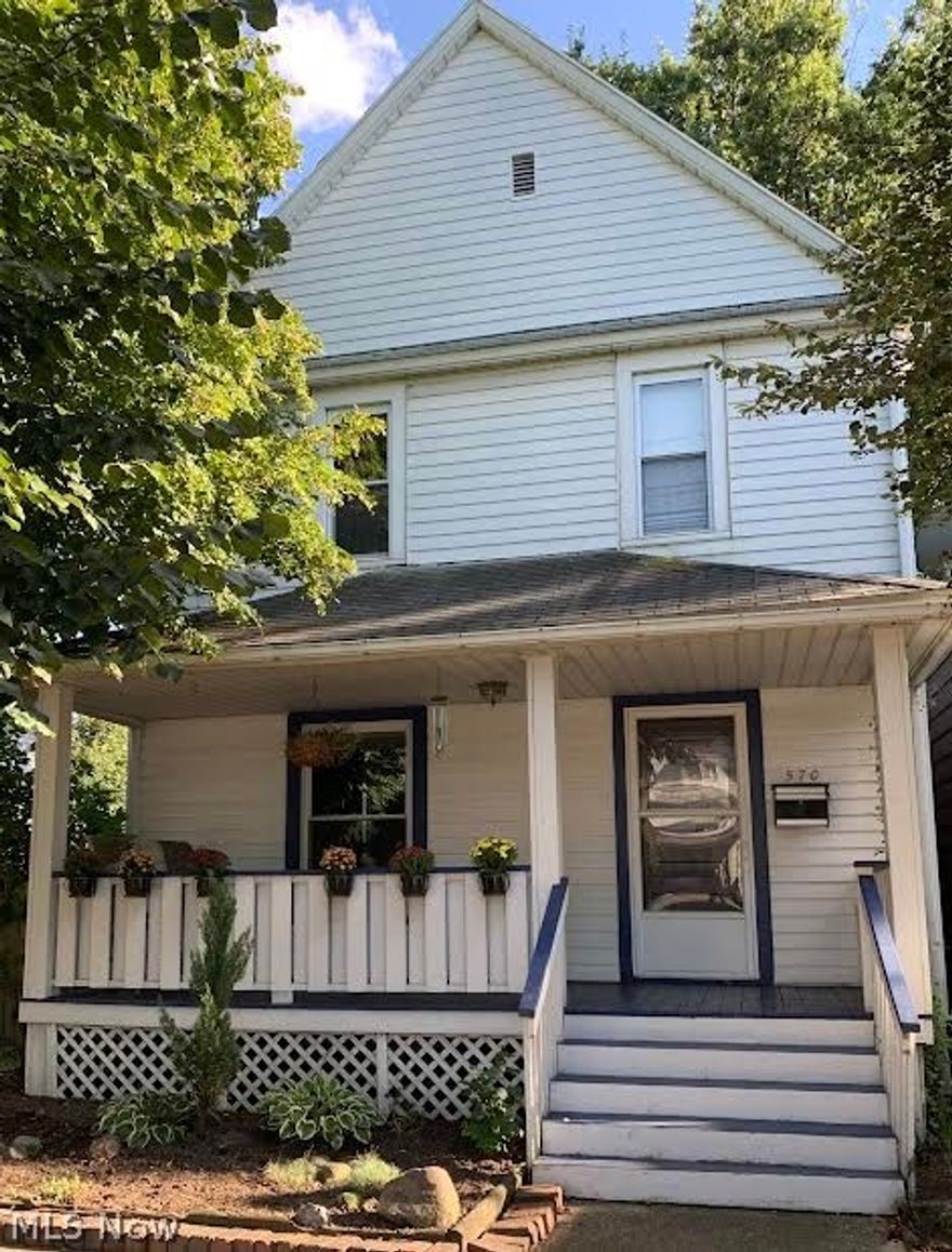 A charming century home in the heart of Barberton. You will fall in love with the beautiful woodwork, including the original pocket doors and hand-painted murals. This home features a bright and cheery eat-in kitchen and dining room, plus a full bedroom and bath on the main level. The upstairs could be used as a rental, with its own kitchen and living space, plus laundry, a full bath and two bedrooms. Outside you will be wowed by the oversized yard, with garden beds, ready for your green thumb. There is also an attached garage and plenty of off street parking in back of the house. 
Just a few blocks away from Lake Anna- This house has so much to offer and is truly a work of art!