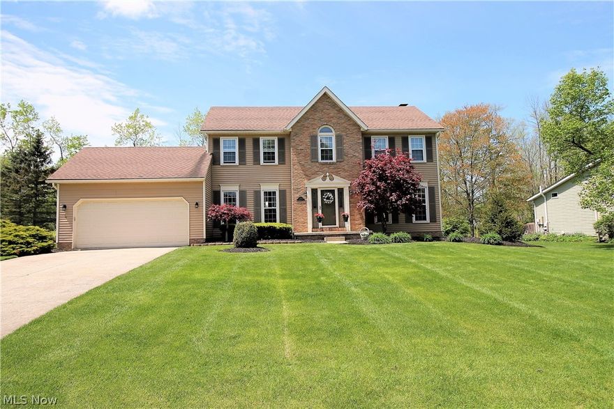 Welcome to this four bedroom, two and a half bath classic colonial home.  The sensational open floor plan is great for entertaining and has a family room with 
a wood-burning fireplace and new bay window overlooking the spacious, private backyard.  The updated kitchen has ceramic tile throughout, stainless steel appliances, beautiful oak cabinets, tile back splash, and recessed lighting.  The eat-in kitchen area contains a new, rear slider door which opens onto the completely refurbished and stained deck 2016.  The dining room and living room are off of the foyer while the half bath and laundry room are off of the kitchen completing the first level. The second level contains four bedrooms.  The master suite offers a newly remodeled master bath 2018 consisting of a new tile shower, marble top double vanity, tile floor, and new fixtures.  New hard-wired smoke detectors on all three levels. The finished lower level offers new carpet 2019 along with a unique, knotty pine ceiling.  Office