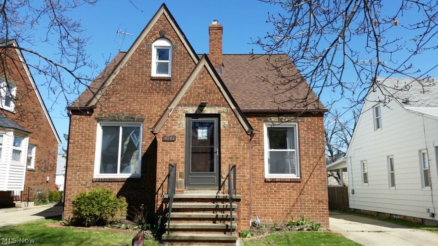 Adorable 3 bedroom home with full basement.  Beautiful brick front adds charm to this updated home. Vinyl replacement windows. New Roof 2014. Electric updated to 100 amp service. C/A and furnace both updated 2010. The kitchen includes appliances: stove "07" &  fridge 2010. The unfinished lower level includes washer and dryer "08".  Updated bathroom. Huge Master Suite w/walk in closet & sitting area. Garage has opener. Drain and Gas line run out to it. Fully fenced yard too! It is looking for a new owner!