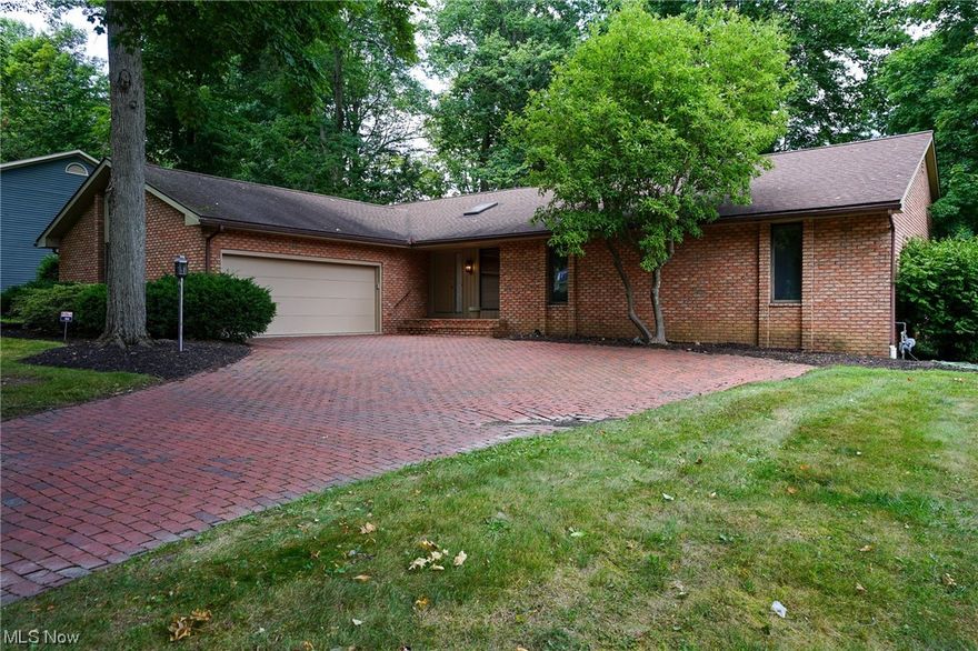 Welcome home to this custom brick, 3-bedroom, 2.5 bath ranch located in the desirable Bob-O-Links allotment in North Canton Schools. Upon entering the front doors, you will feel the love and entertainment that occurred within these walls over the last 29 years that the seller enjoyed so much. Your eyes will be drawn to the expansive great room featuring vaulted ceilings with barn wood beams and mantle, with a gas fireplace. The dining room leads you to the eat in kitchen with plenty of counter space, beautiful Shrock cabinets, with a walk-in pantry. Off of the kitchen area there is one step down into the cozy 4 seasons room. The primary bedroom is oversized and truly a private oasis! The suite includes a gas fireplace, with enough room for a sitting area and a large walk-in closet. The primary bathroom has a double vanity, tiled shower and a tub with a beautiful custom stained glass. The rest of the house includes two additional bedrooms, a large full guest bathroom, oversized laundry room with a double closet for amazing storage with the 1/2 bathroom around the corner. 2 car garage with glazed tiled walls with water access. The basement is unfinished and ready for you to make it what you want! The secluded backyard is wooded with two decks with two access points into the home. Seller has purchased a one-year home warranty! Updates Include: 2023-AC & Furnace, Hot Water Tank, Deck Power Washed, Carpets Cleaned. 2022-Refrigerator, Garage Door Opener and Keypad. Selling As Is.