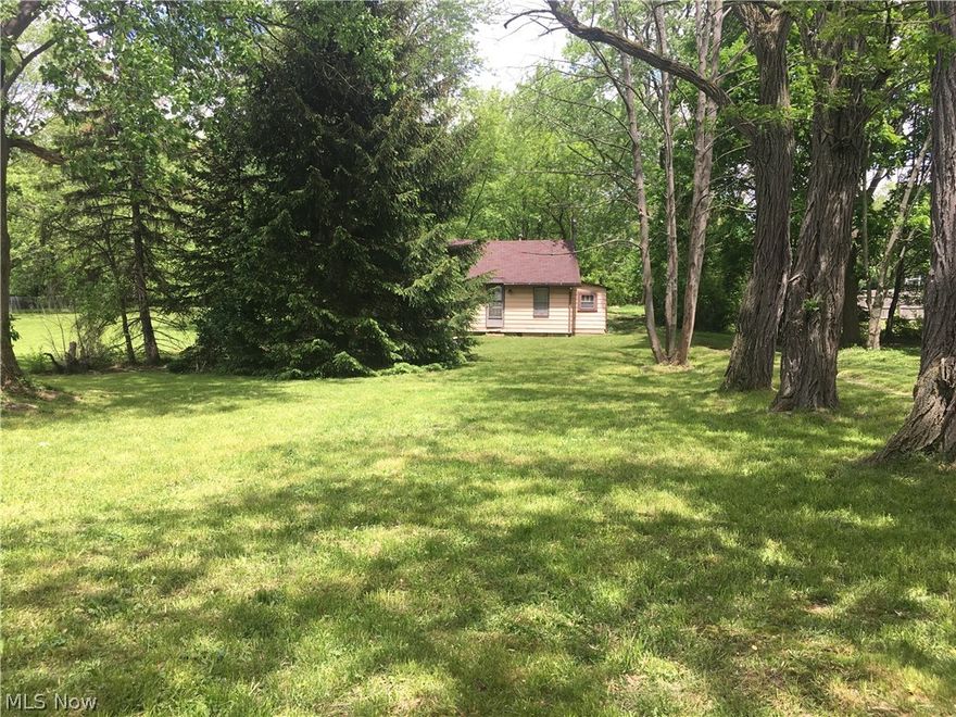 Very small home on site in rough condition  -   Value Is In The Land   -  City sewer and water    -   .4287 Acre
Great location just West of Five (5) Points, very convenient to all  Tallmadge amenities  -  Residentially Zones
Front 75 feet         Back  80.32 feet             West side (left)  264.35 feet      and   East side (right) 235.61   
  - No delays to close     -  Sold As Is Where Is       -       Nice Opportunity!