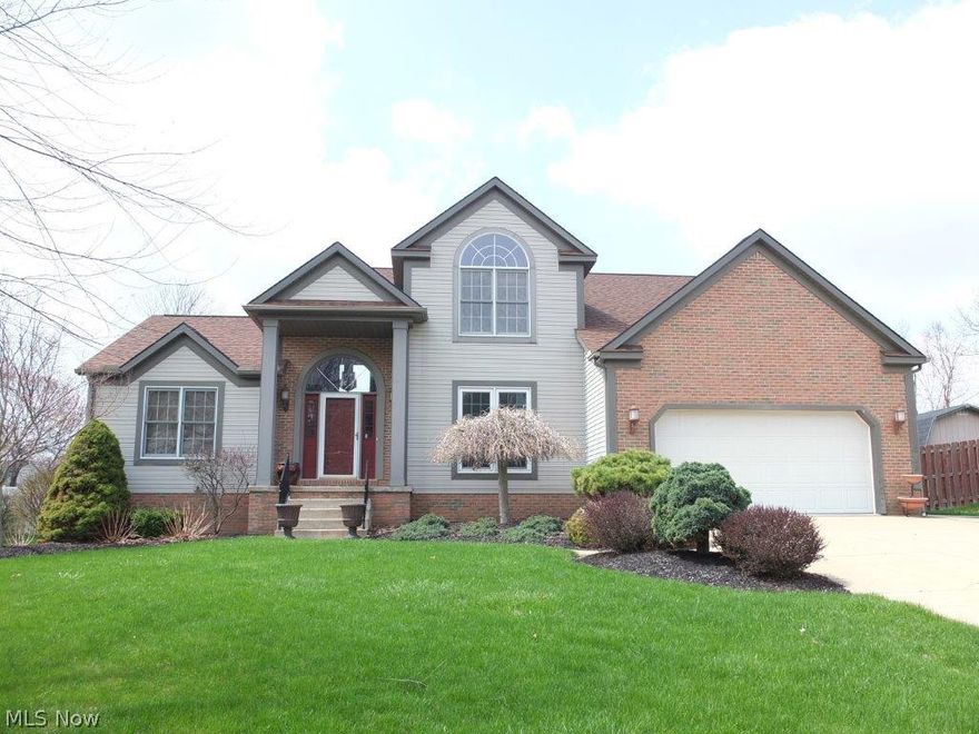 Move right into this spacious 4 bedroom, 2.5 bath home with 1st floor master suite! Feel immediately welcomed into this home by a 2 story foyer with hardwood floors. Open and inviting floor plan offers 2 story great room with floor to ceiling stone fireplace, formal dining room, large kitchen with dinette, breakfast bar, pantry, ceramic tile floor, built in desk, refrigerator, gas range, oven, over the range microwave and butler bar! Desirable 1st floor master suite has vaulted ceilings and complete master bath with double sinks, makeup vanity, soaking tub, separate shower, huge walk in closet, skylight and tile floor. What a retreat! 3 additional bedrooms, full bath and loft area that could be used as an office or another living space on the 2nd level. Bedroom 2 has a vaulted ceiling. Full basement allows for plenty of storage or could be finished for even more living space. Fully fenced backyard with stamped concrete patio, pergola and invisible pet fence too! 1st floor laundry room,