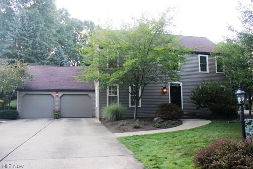 Stunning inside & out! This 3 bedroom, 2 full/2 half bath Colonial with 2504SF including rec room starts with lovely landscaping & state of the art siding (2013) "Everlast" with 50 year warranty & updated exterior lighting (2013)* Foyer entry with wood floor & wide crown molding* Open living room & family room with fireplace* Dining room with wood floor with wide crown molding* Spacious eat in kitchen (2004) with Hickory cabinets, earth stone counter top, custom hardware, pantry, ceramic backsplash & floor & cabinet lighting* Appliances (2013)- high end Kitchen Aid induction & convention oven, microwave & dishwasher*Eating area with ceramic floor with desk & slider to patio* 1st floor laundry & updated 1/2 bath* Upper level master with walk in closet & updated master bath, guest bath & new Pella high eff. windows (2013)* Lower level rec room with glass block windows built in desk/work area, walk in closet & 1/2 bath* Private park like back yard with stamped patio (2010) & gas grill wit